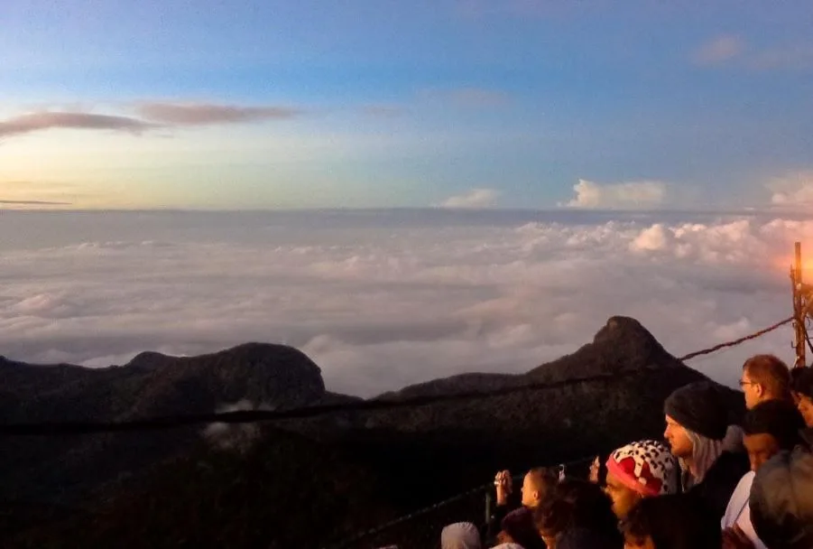 Spectacular sunrise and shadow cone from the summit of Adam's Peak