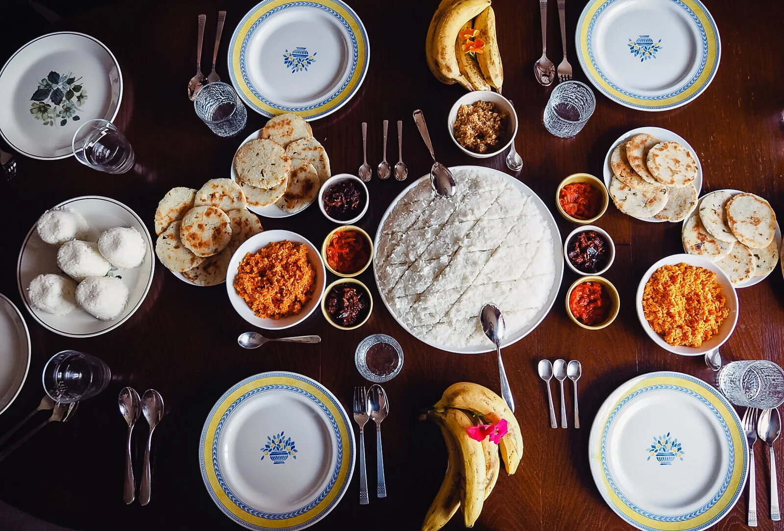 Traditional Sri Lankan breakfast feast with hoppers and tea