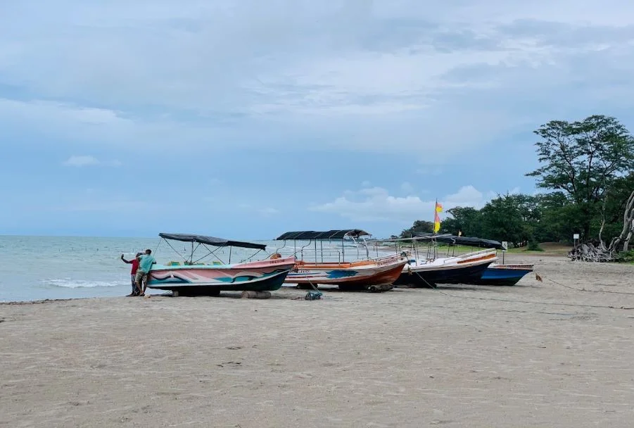 Calm turquoise waters and soft sands at Casuarina Beach on Karainagar Island