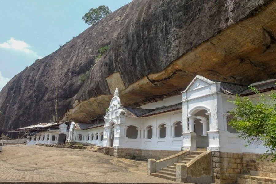 Ancient gilded Buddha statues inside Dambulla Cave Temple
