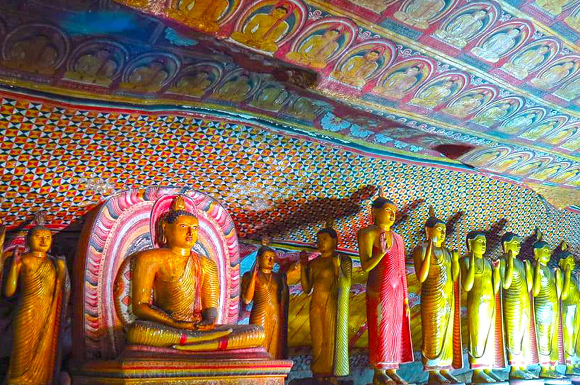 Whitewashed colonial colonnade and front corridor overlooking the courtyard at Dambulla Cave Temple
