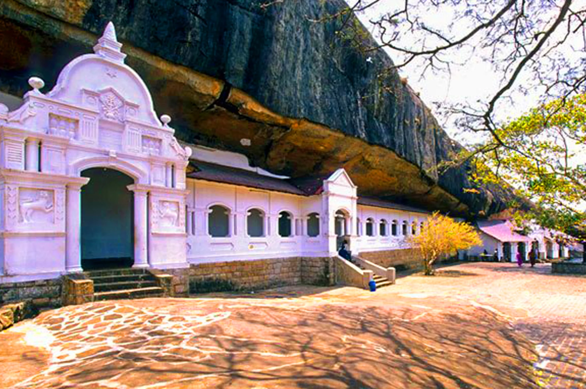The Devaraja Lena cave housing the 14-meter rock-cut reclining Buddha in Dambulla