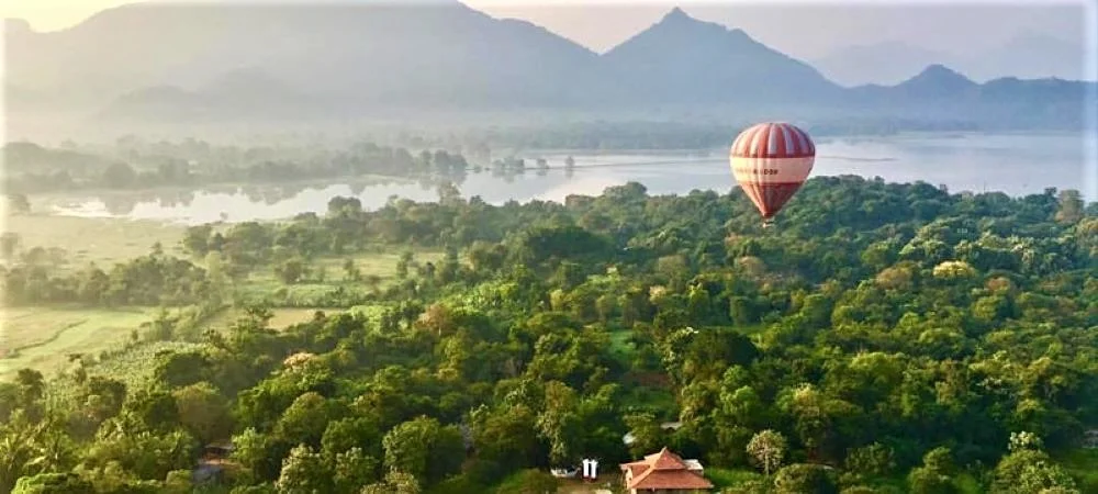 Hot air ballooning over Kandalama at sunrise
