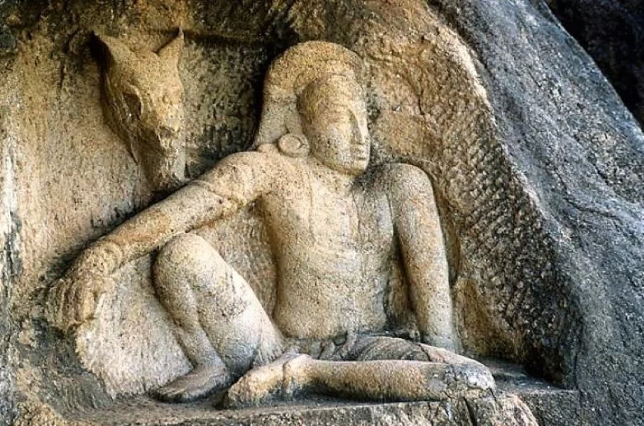 Intricate stone relief carving of the Man and Horse at Isurumuniya