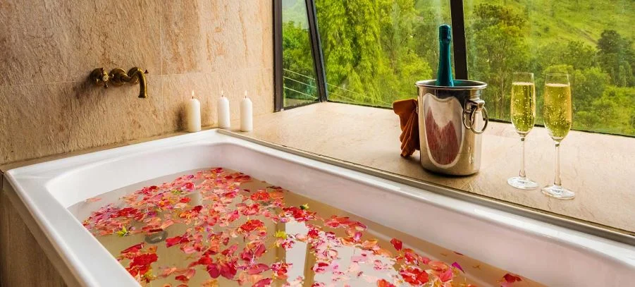 Boutique luxury resort infinity pool overlooking lush tropical landscapes