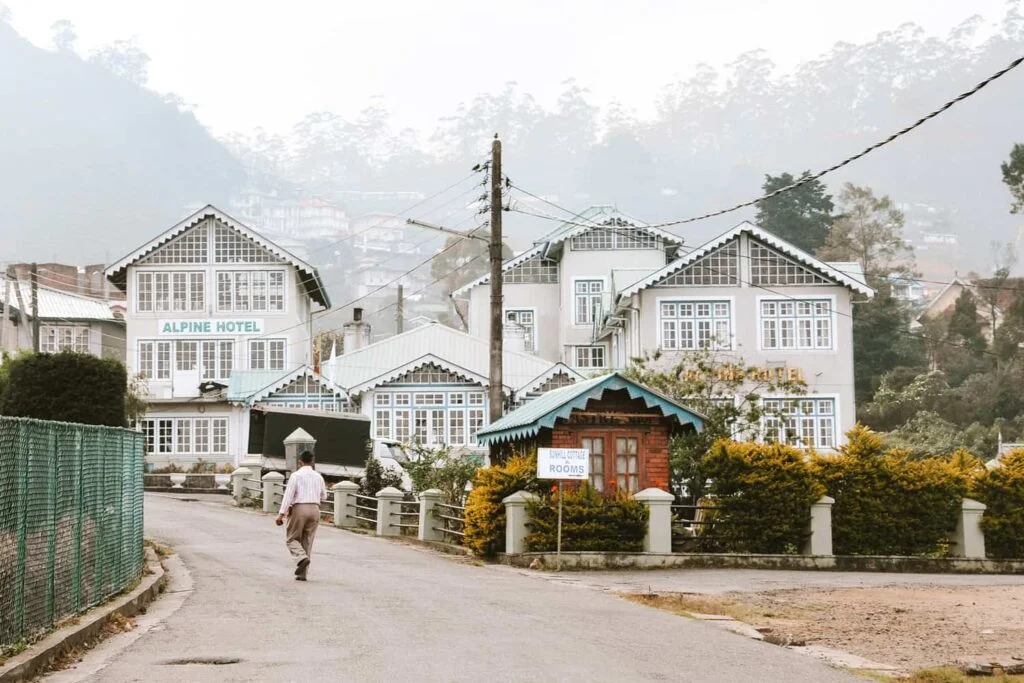 Colonial-style heritage buildings in Nuwara Eliya covered in mountain mist