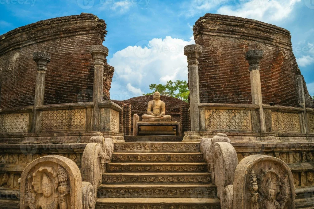 The Vatadage circular relic house with carved guardstones, moonstone steps, and seated Buddha statue