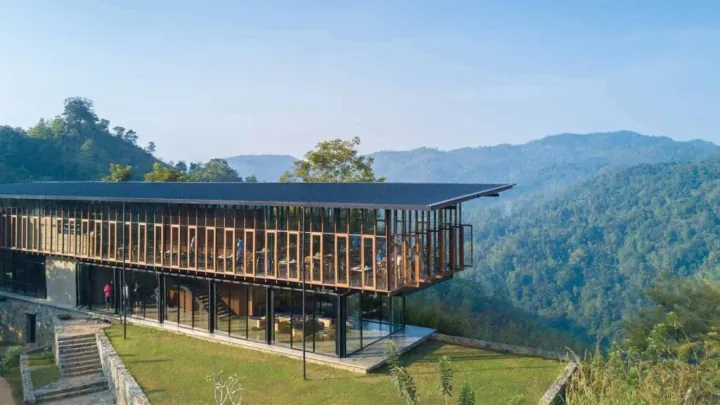 Santani Wellness Resort pavilion overlooking misty mountain valleys