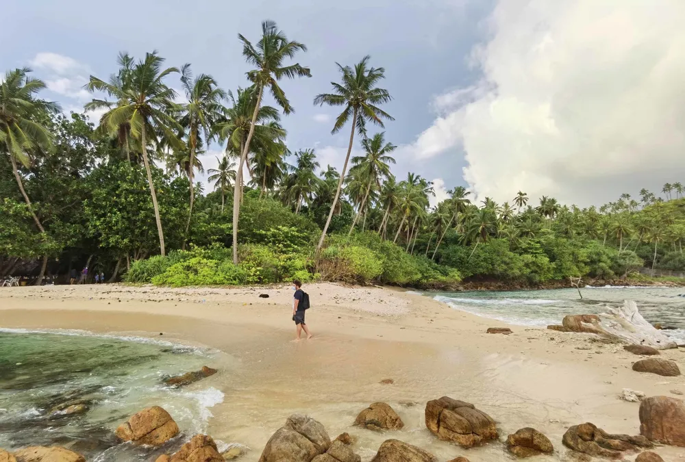 Secluded cove and sheltered tidal waters at Secret Beach in Mirissa