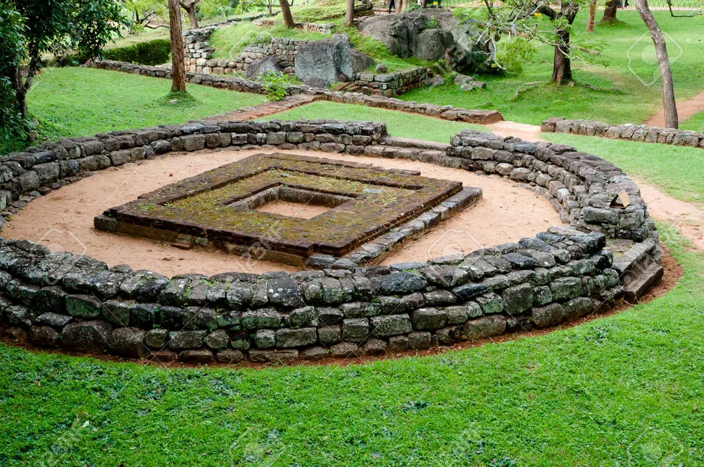 Ancient boulder gardens with drip-ledge caves at Sigiriya