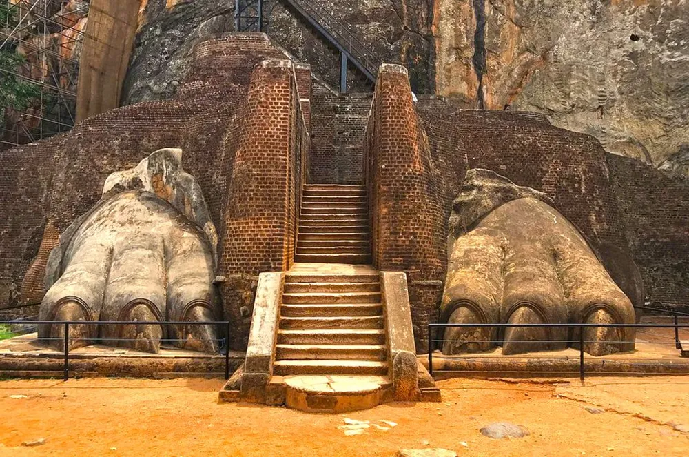 Colossal Lion's Paws gateway sculpture on the northern plateau