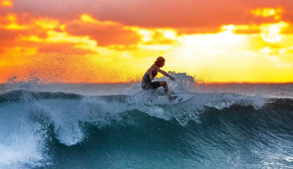 Surfer riding an ocean wave on the south coast