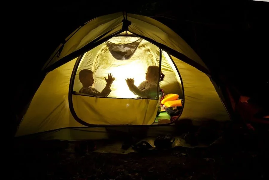 Overnight camping and stargazing around campfire in Sri Lanka