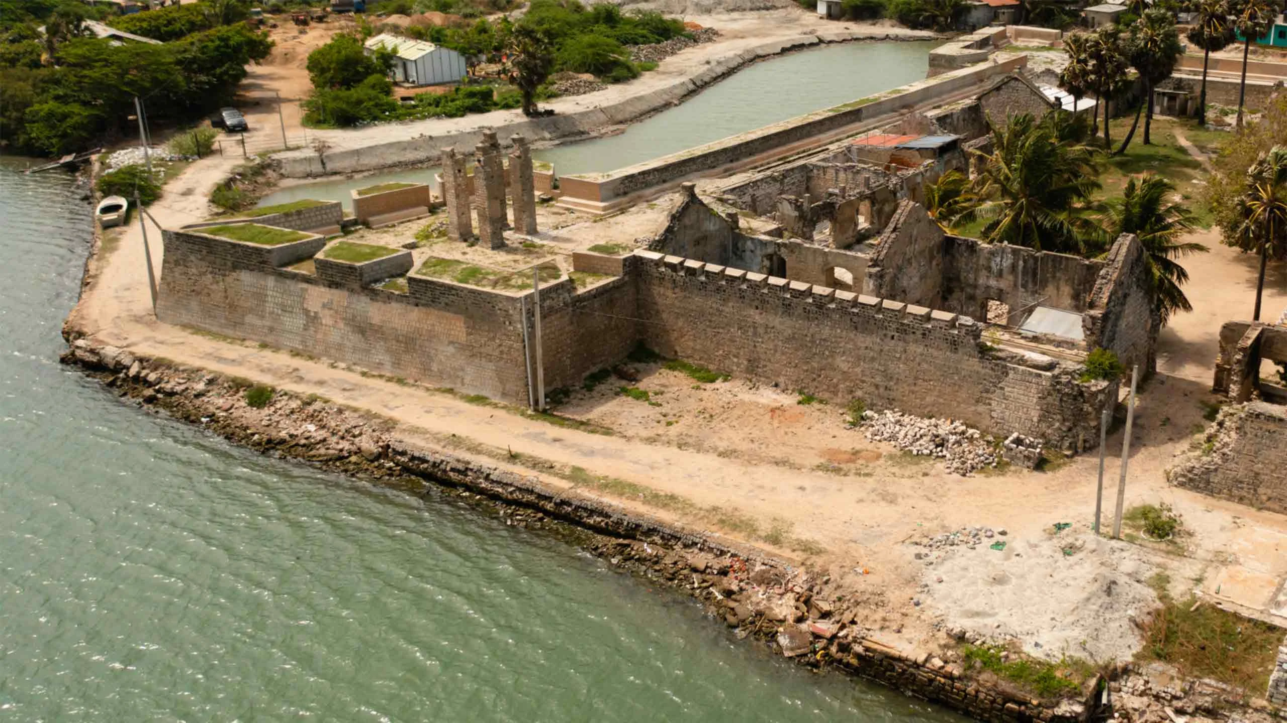 The weathered coral and limestone ramparts of Mannar Fort