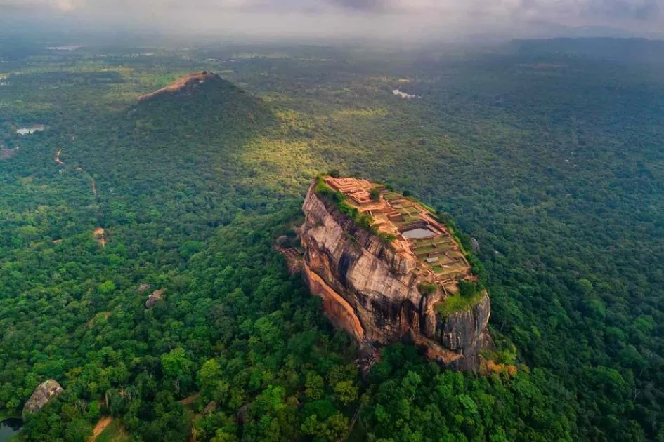 Sigiriya Rock Fortress rising amidst the Cultural Triangle forests